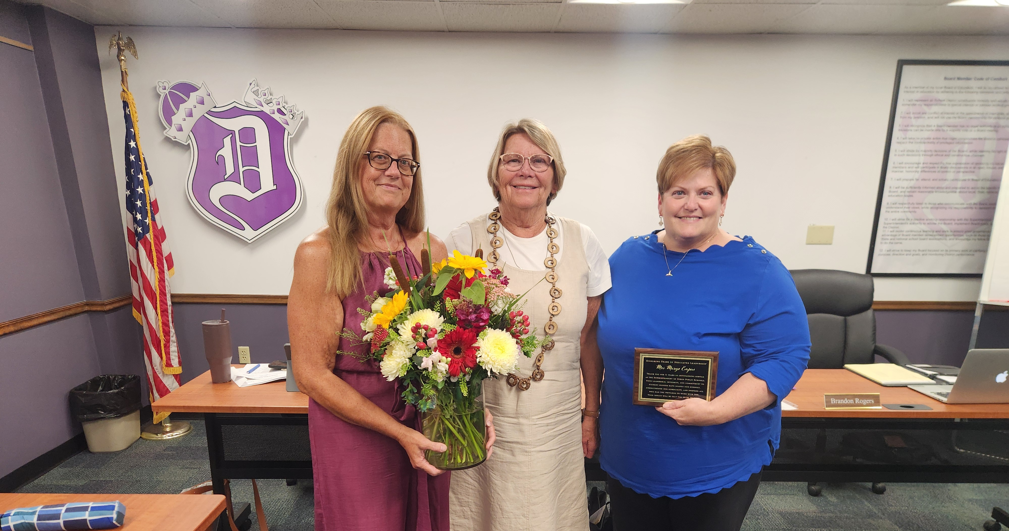 Photo of Superintendent and 2 board members