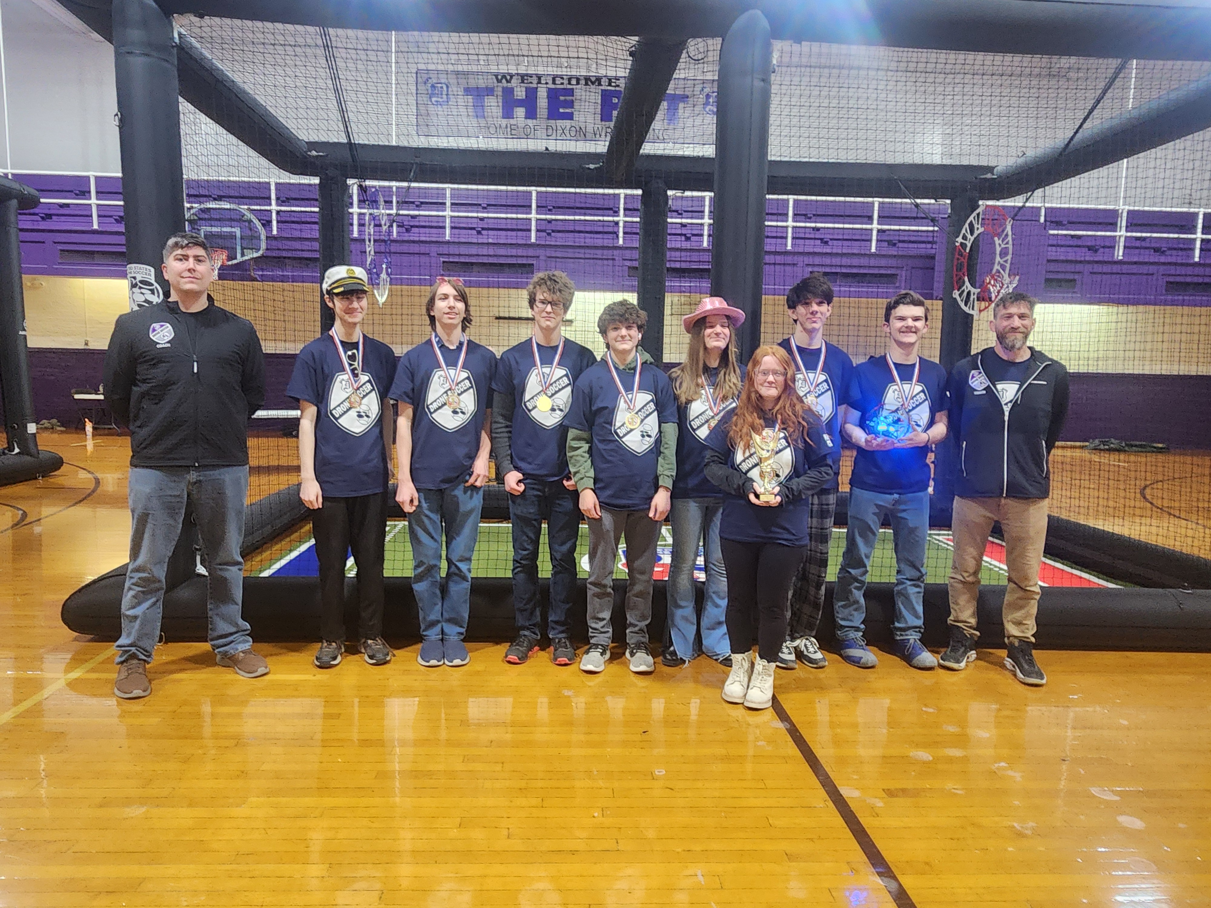 1st Place Drone Soccer Team with medals and trophy