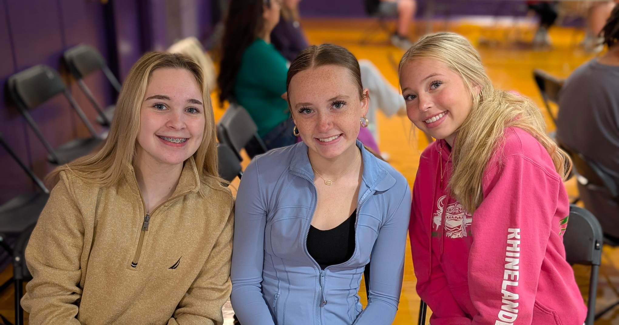 students at the blood drive smiling for camera