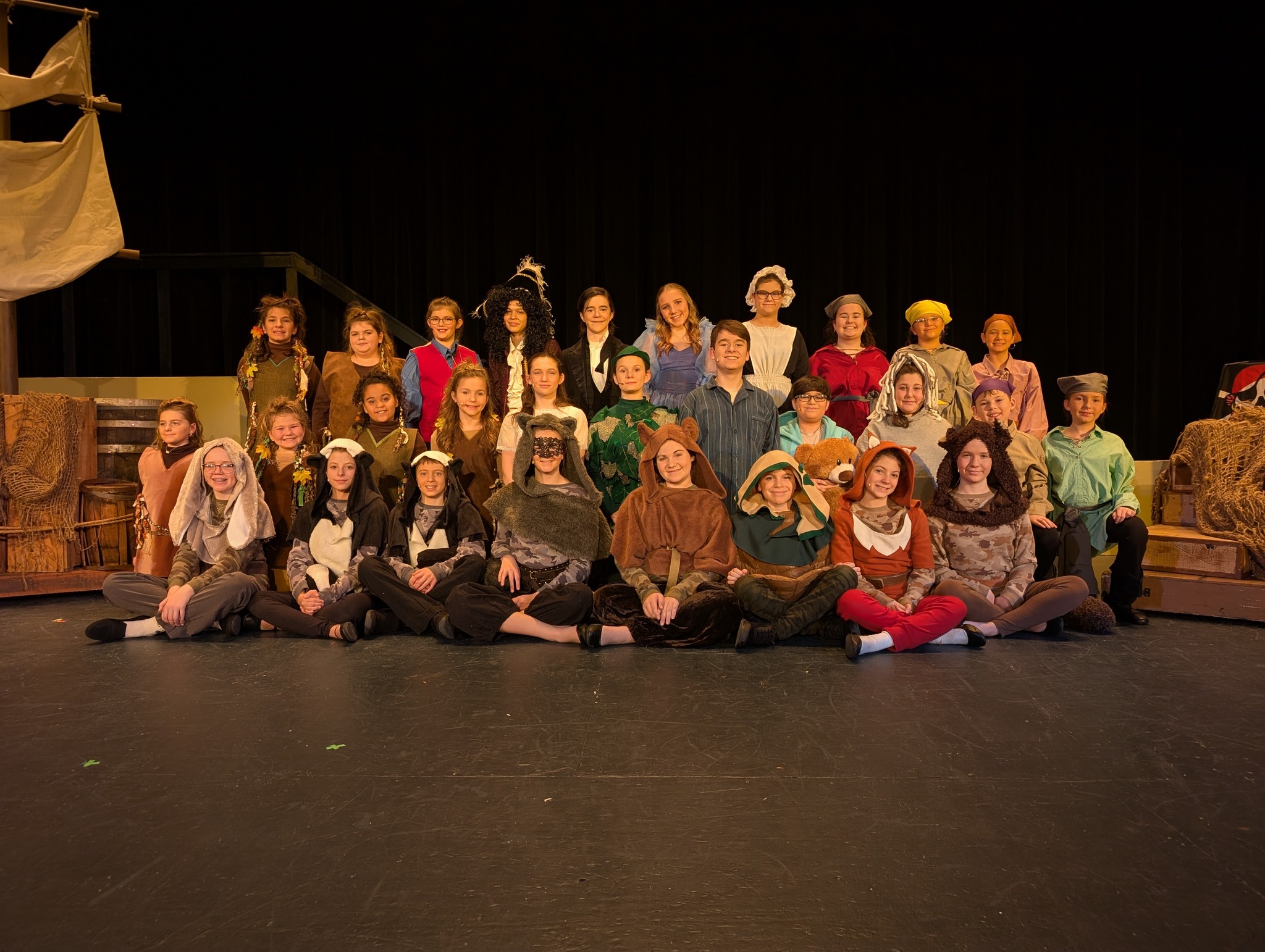 Peter Pan Jr cast sitting for photo