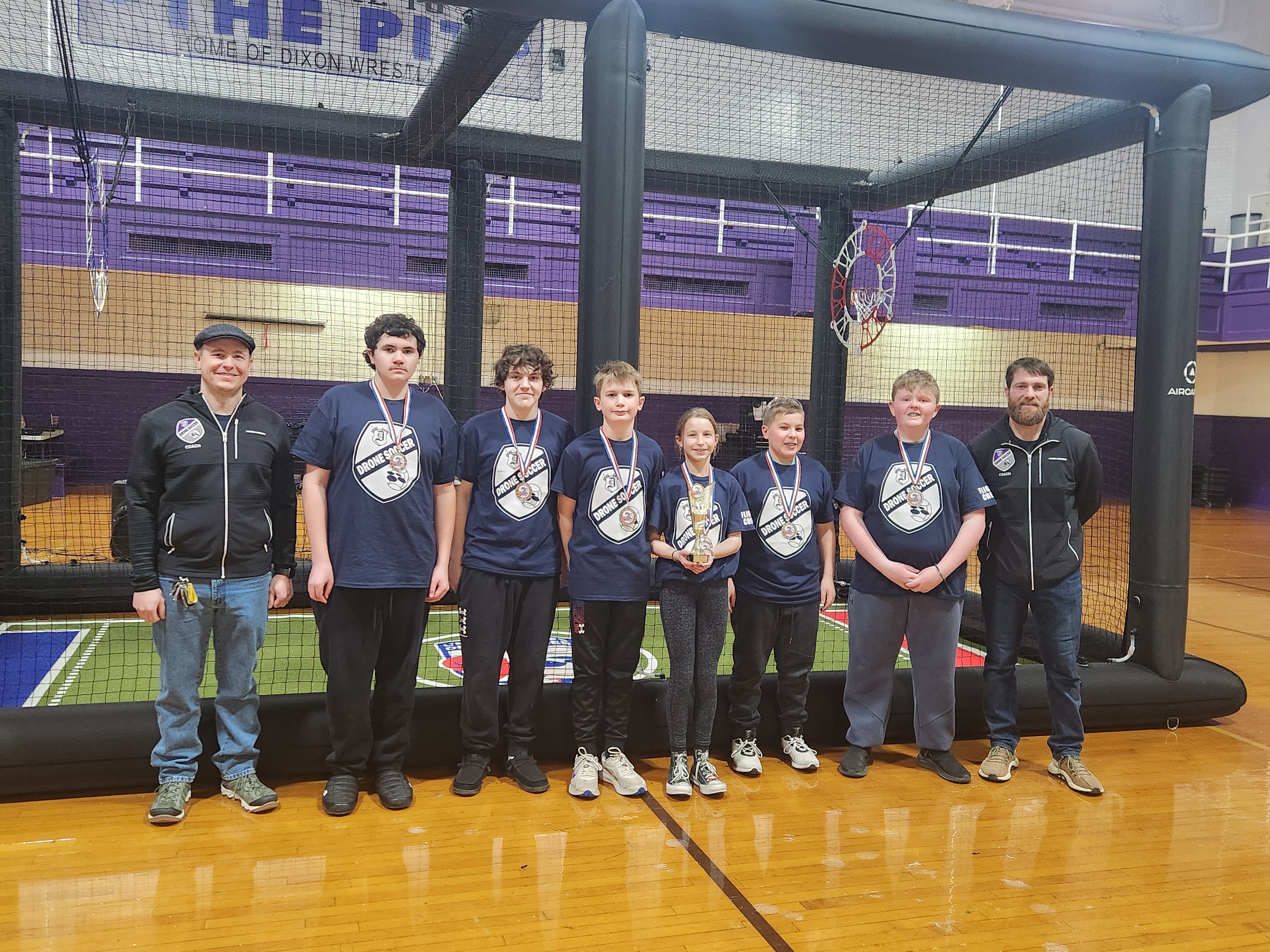 2nd Place Drone Soccer team with their medals and trophy