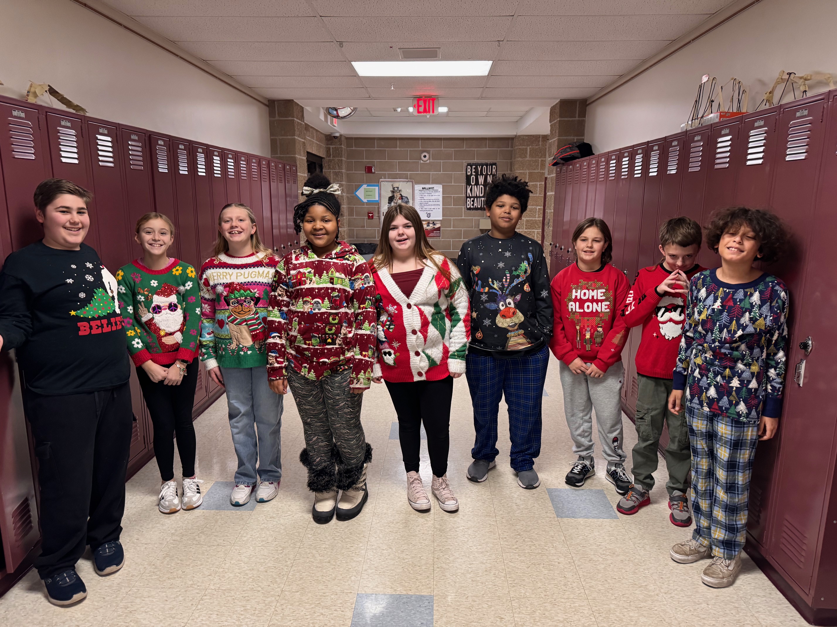 students wearing ugly sweaters
