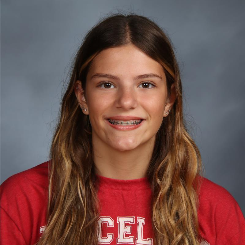 student of the month smiling for camera