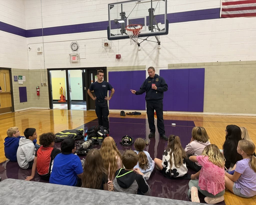 Jefferson school meeting with fire department learning lessons