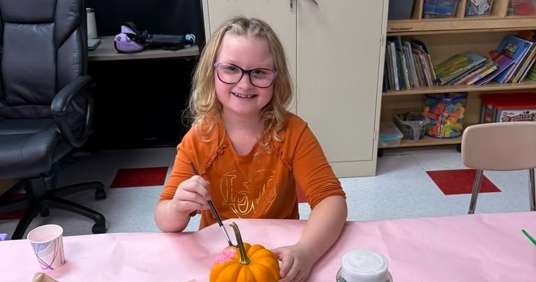 Jefferson students painting pumpkins