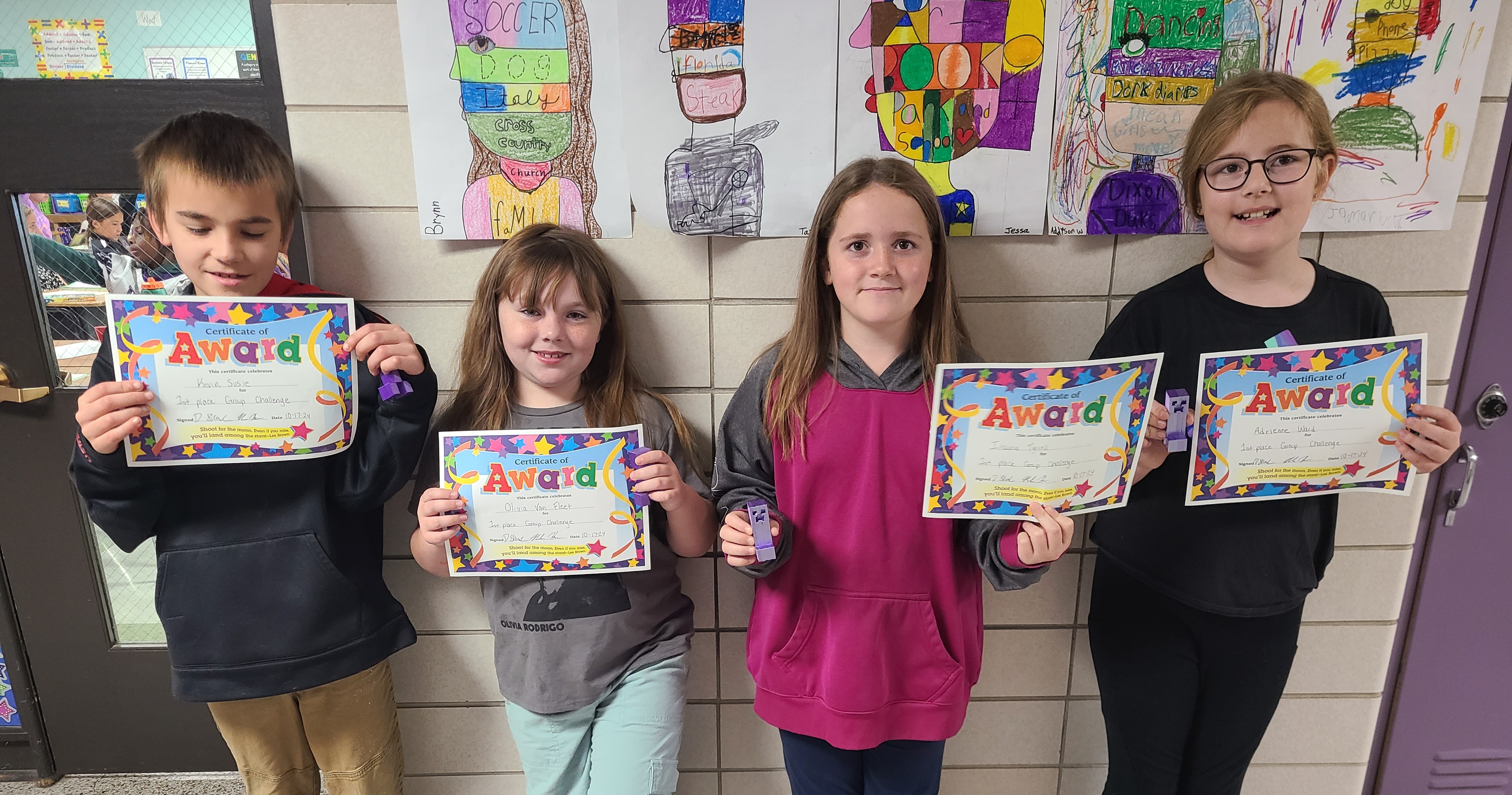 Students holding awards