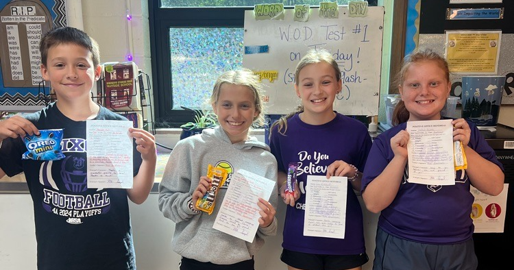 madison students holding awards