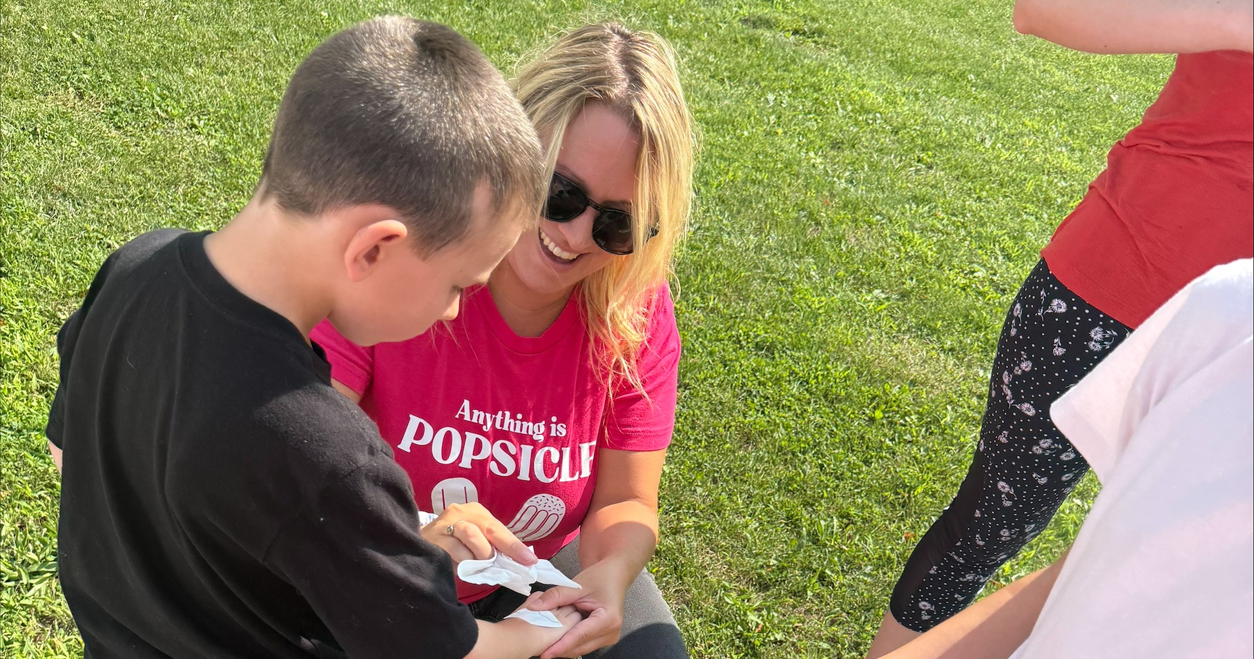 mrs. mitchell helping students at PwP