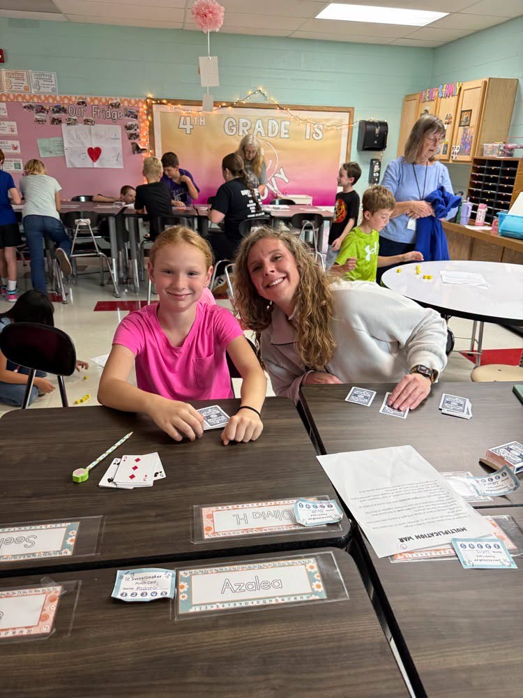Madison student playing game smiling