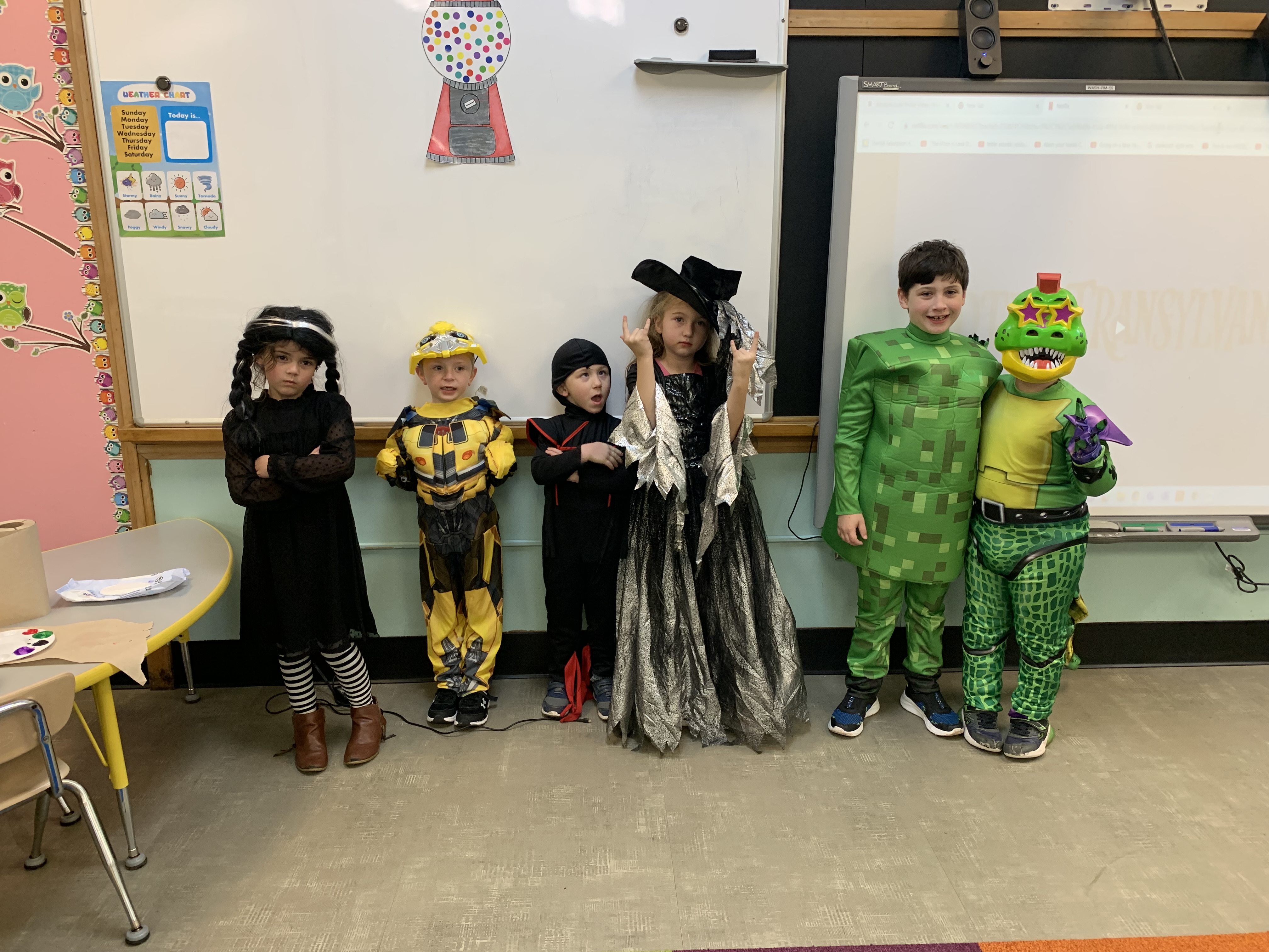Students smiling for Halloween