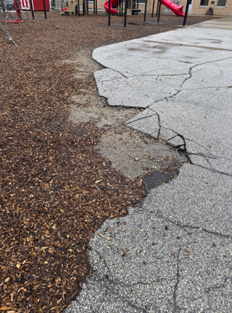 playground surface poor condition