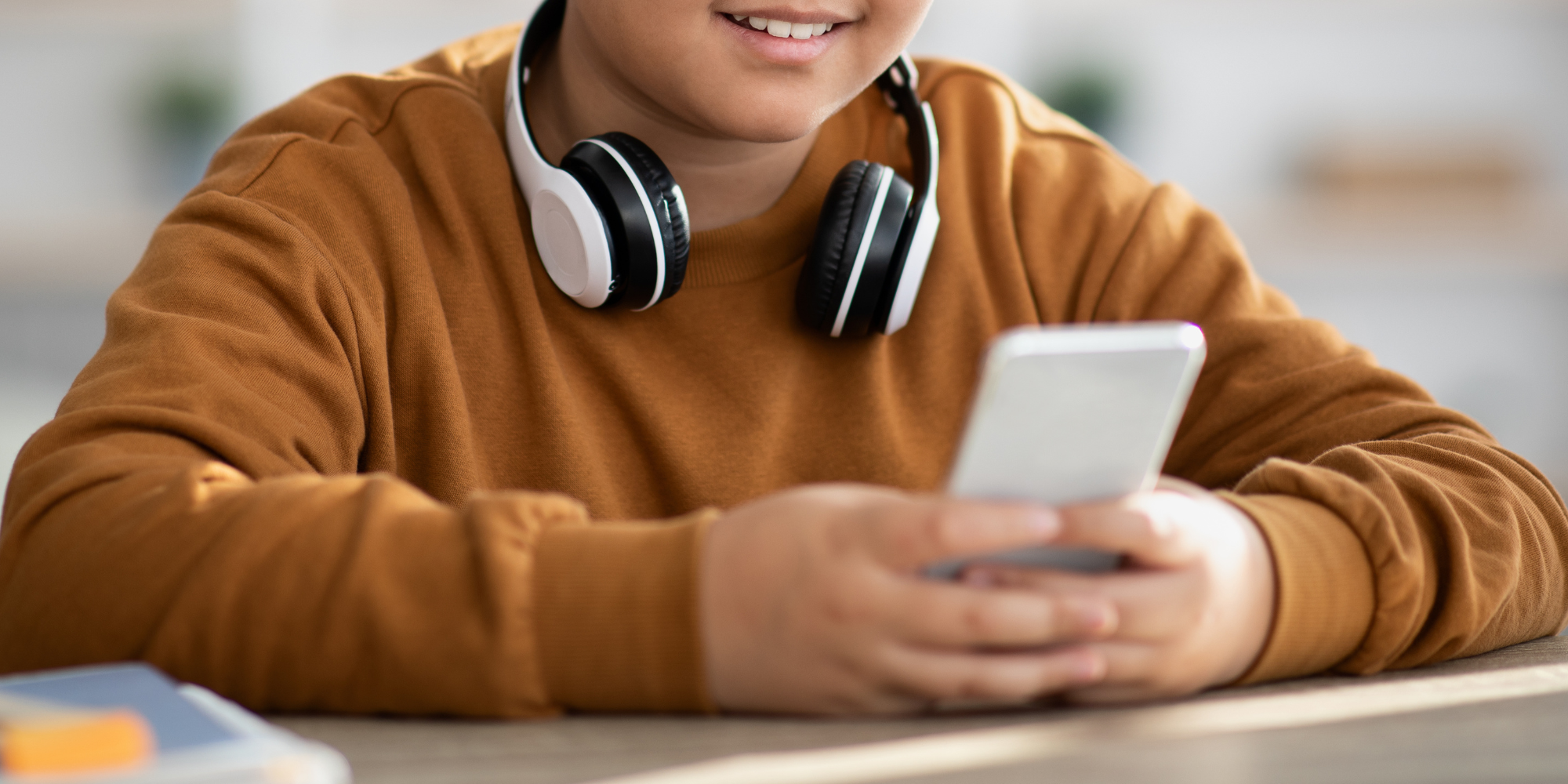 student using cell phone