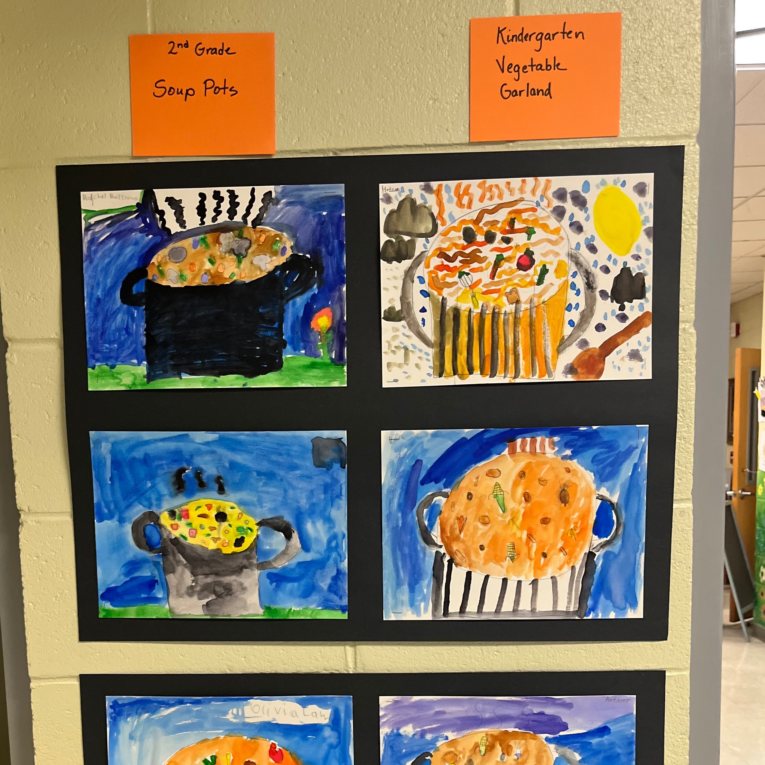 A collage of six colorful paintings of pots and pans filled with food displayed on a wall.