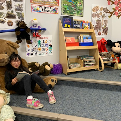 Group of students reading in classroom