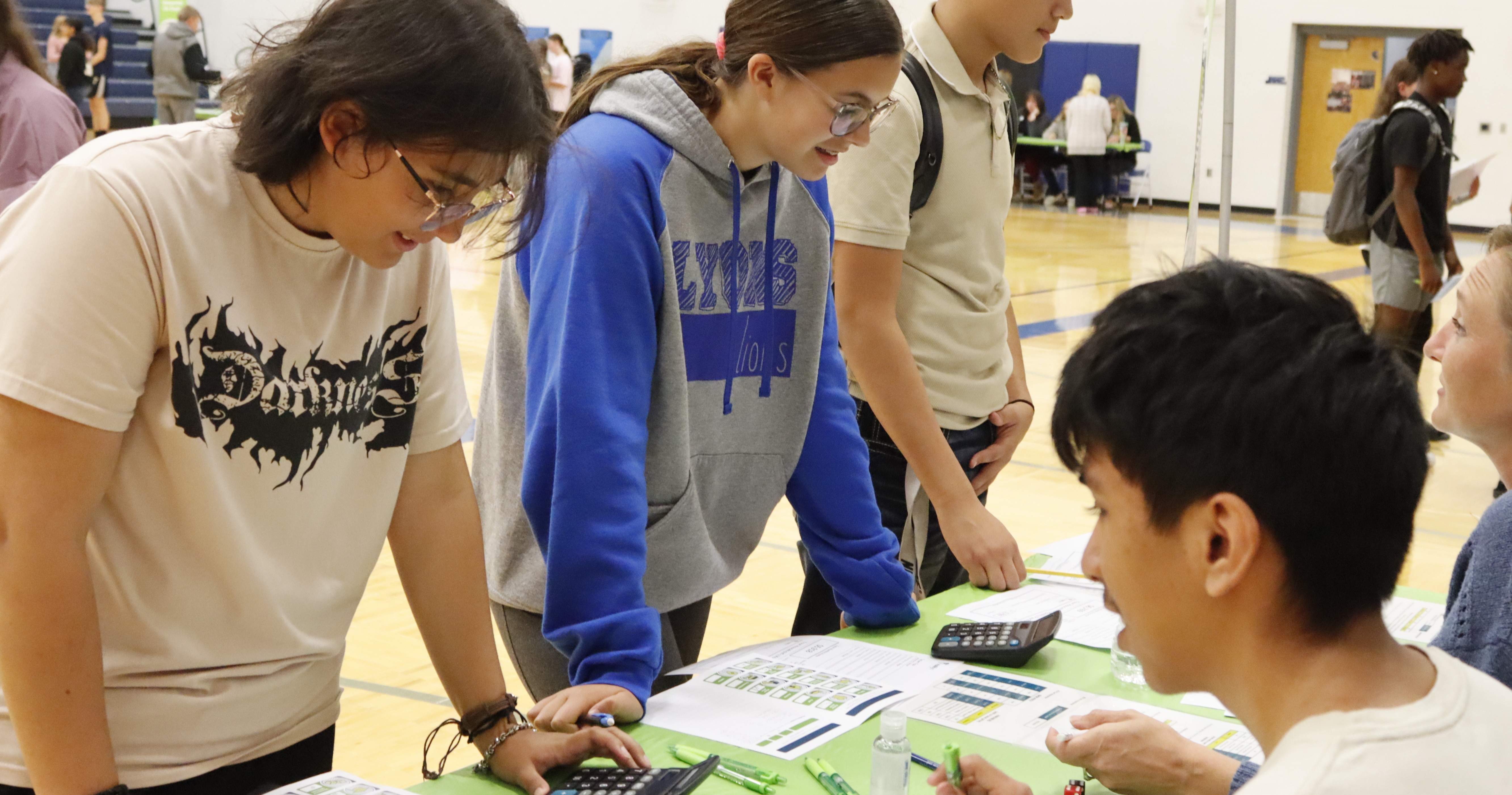 Students gathered around a table