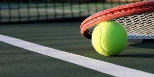 tennis net, racket, and ball