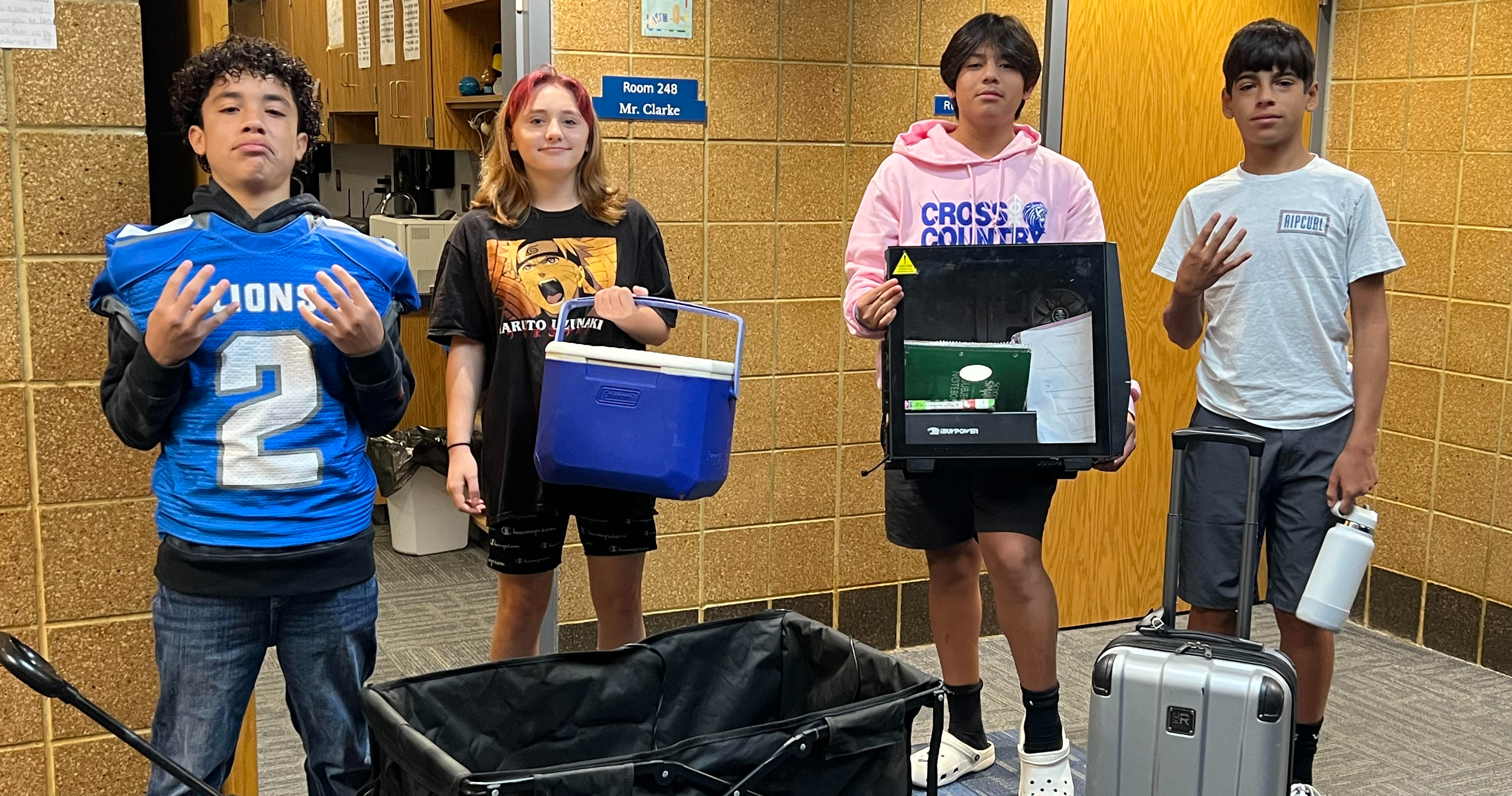Anything but a backpack day. 4 students show their caring item