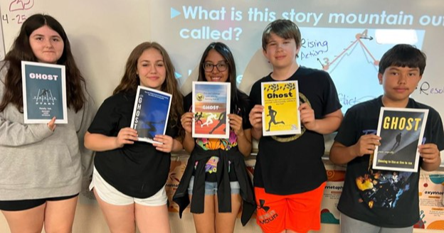  5 7th graders won our cover redesign contest! They created a new cover for the novel Ghost