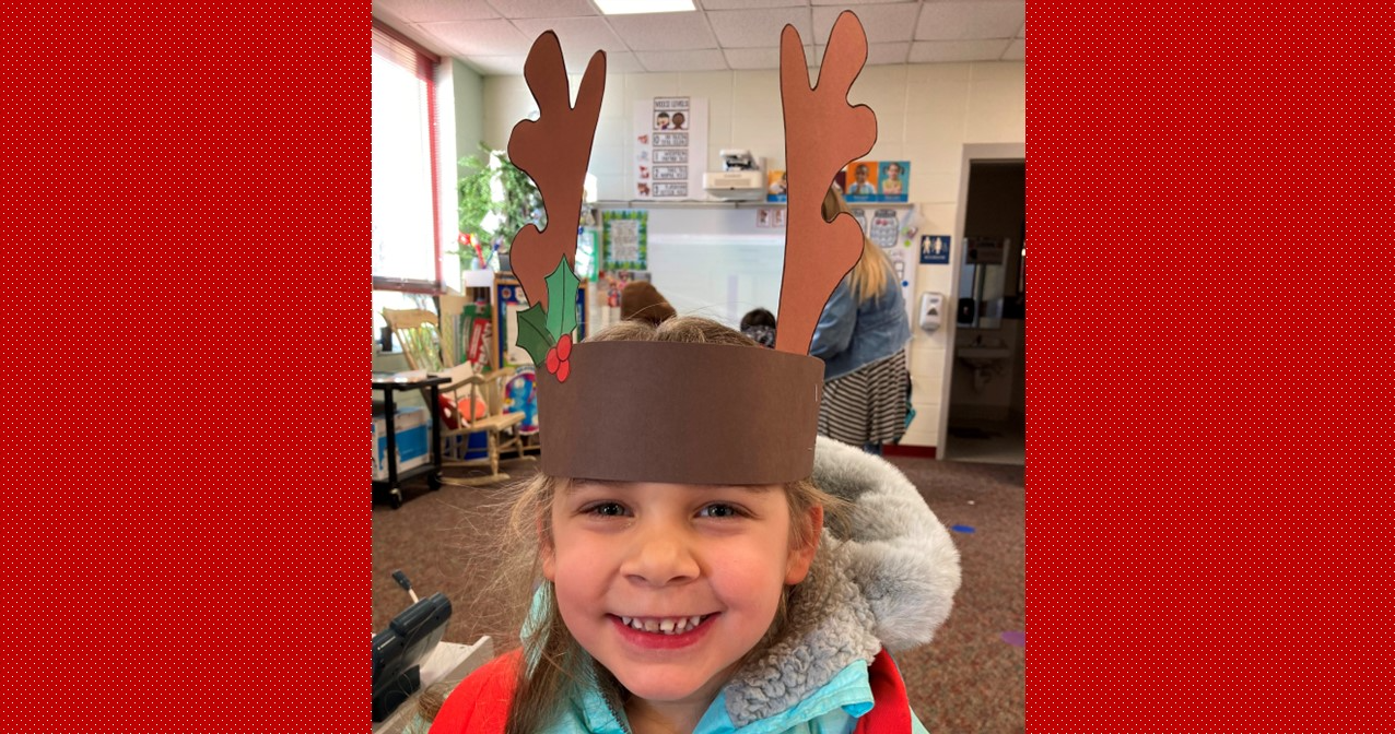 Student with reindeer hat