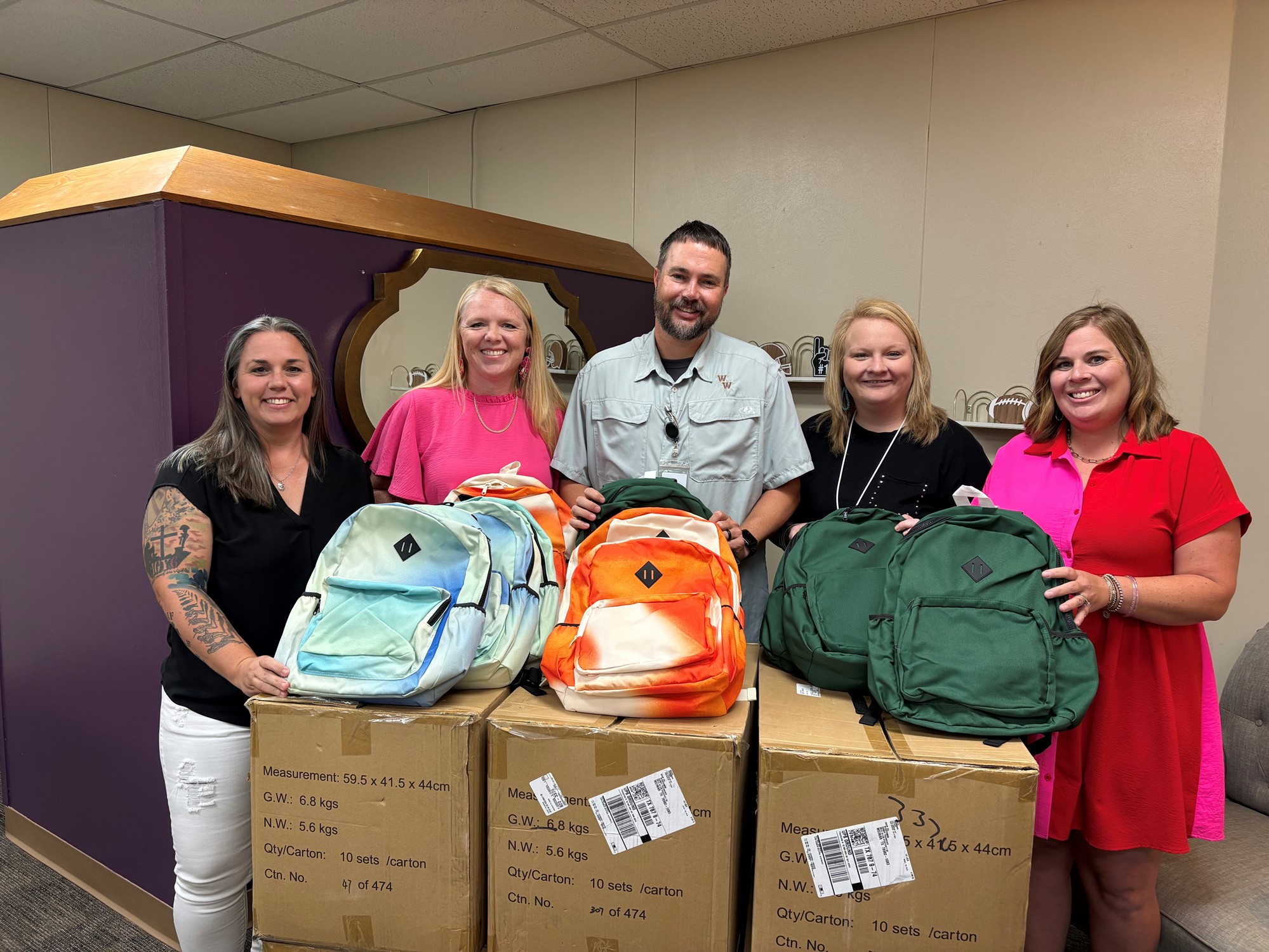 staff with donated supplies