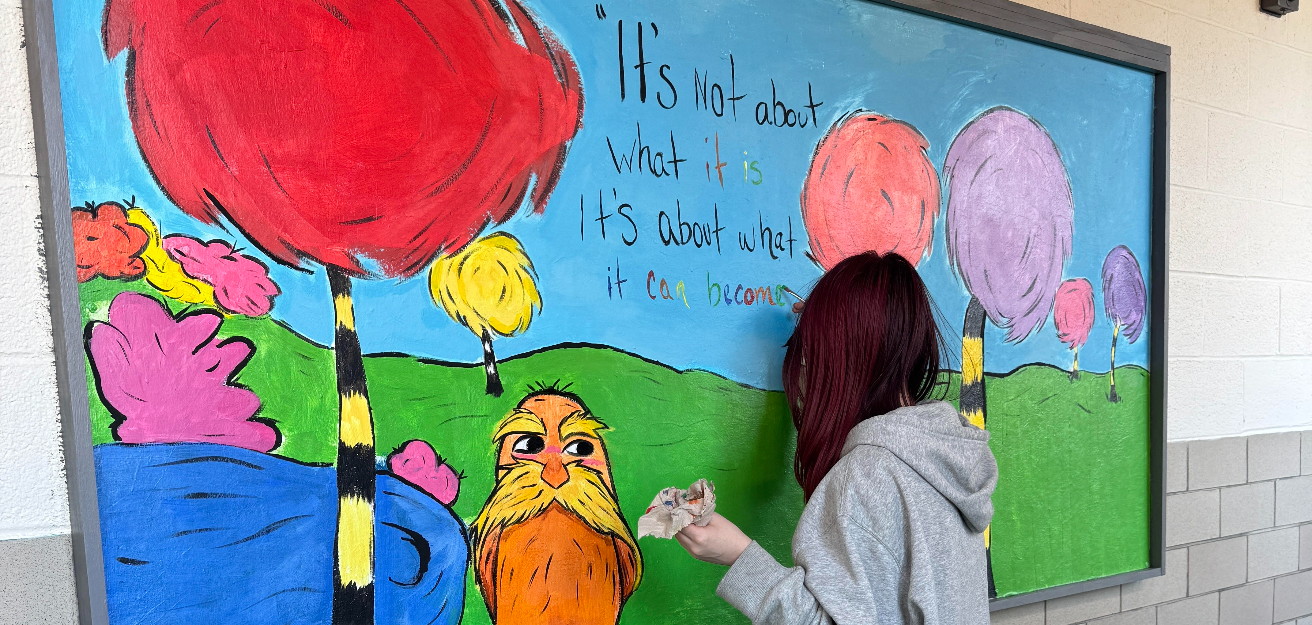 Student Creating Art at DA