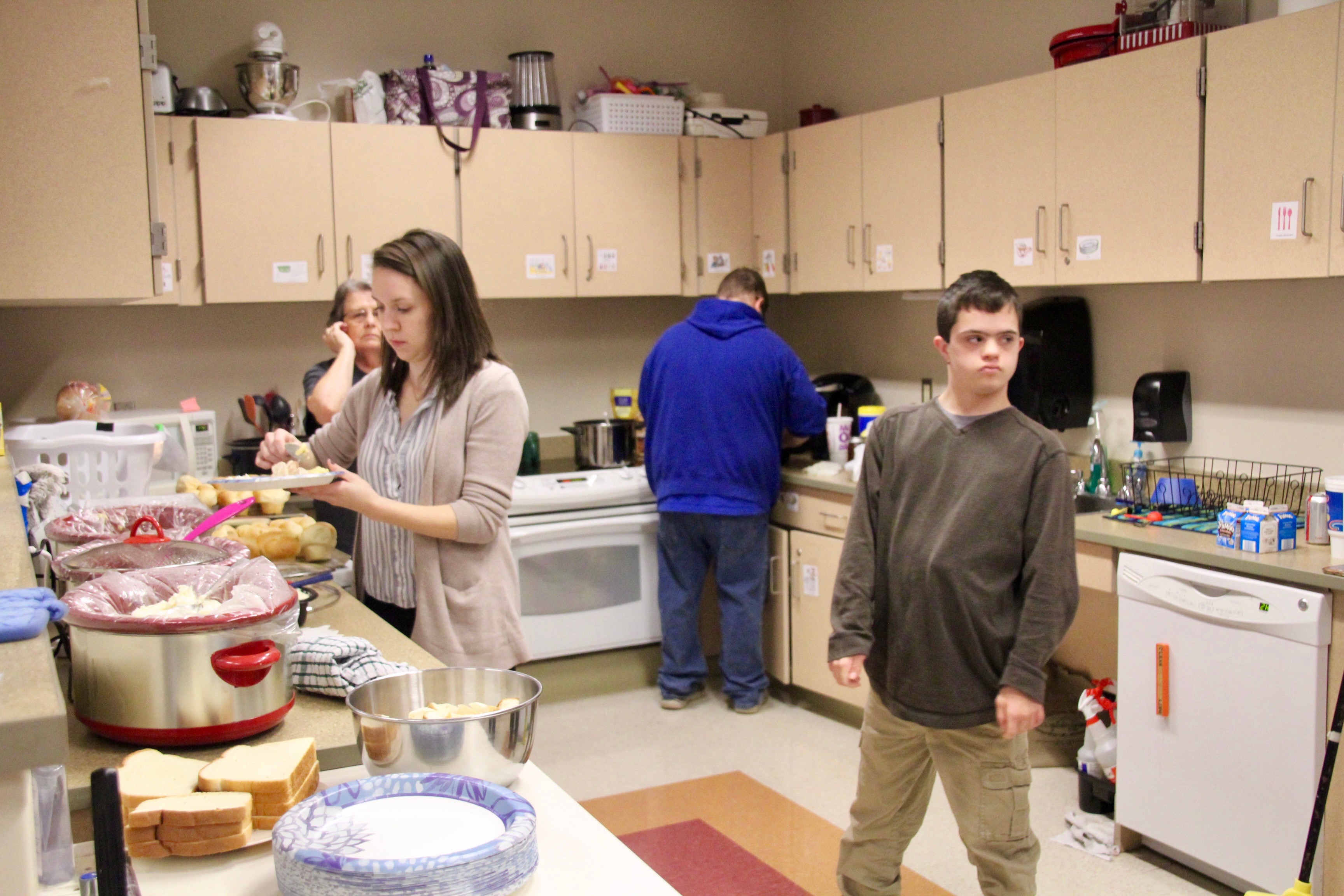 photo of people working in the food pantry