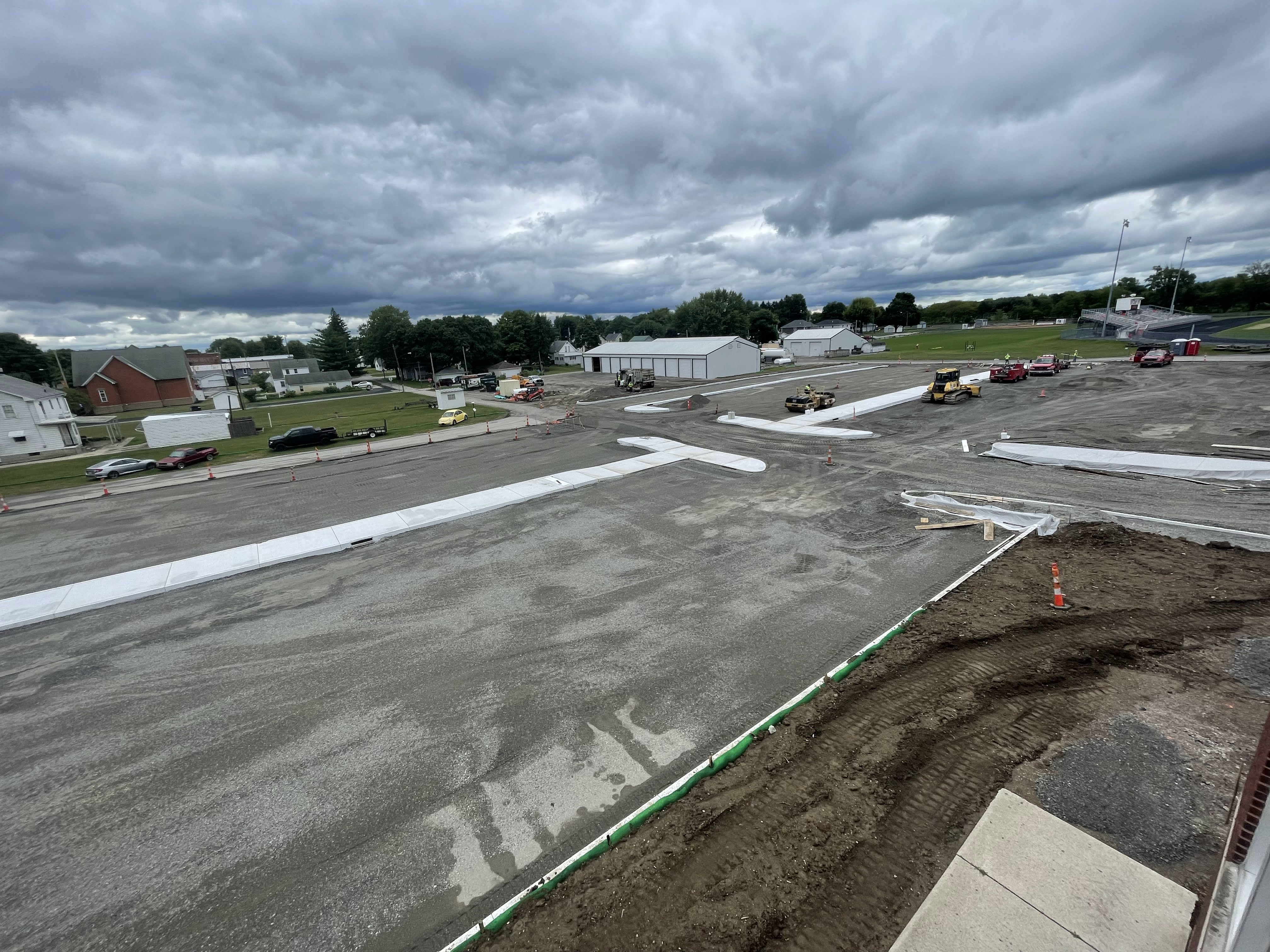 Overview of parking lot with sidewalks and curbs 