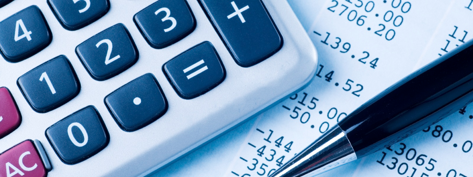 Image of Calculator, receipt in the background and a pen. In reference to Finance