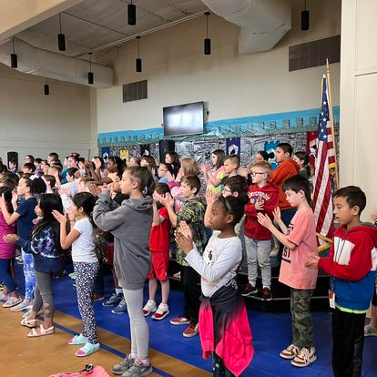 Students rehearsing for music program