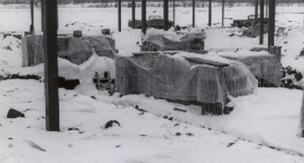 A black and white photo of the beginnings of the school