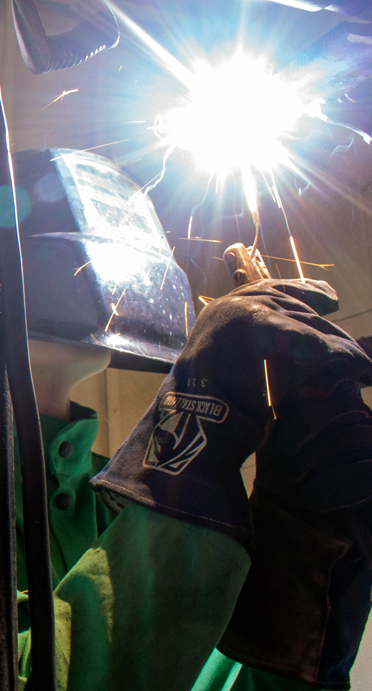 A student practices vertical welding.
