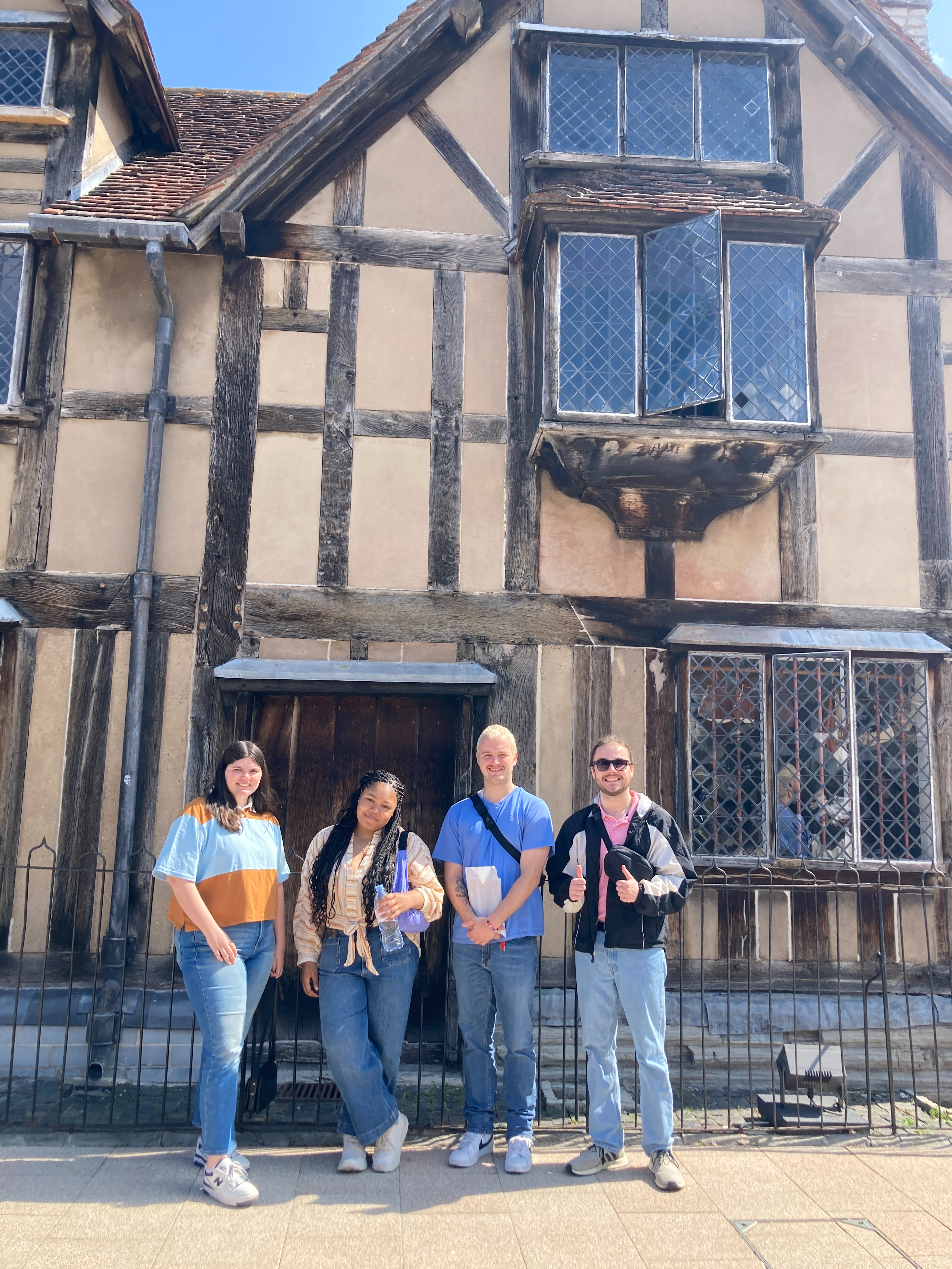 four students in front of Shakespeare's home