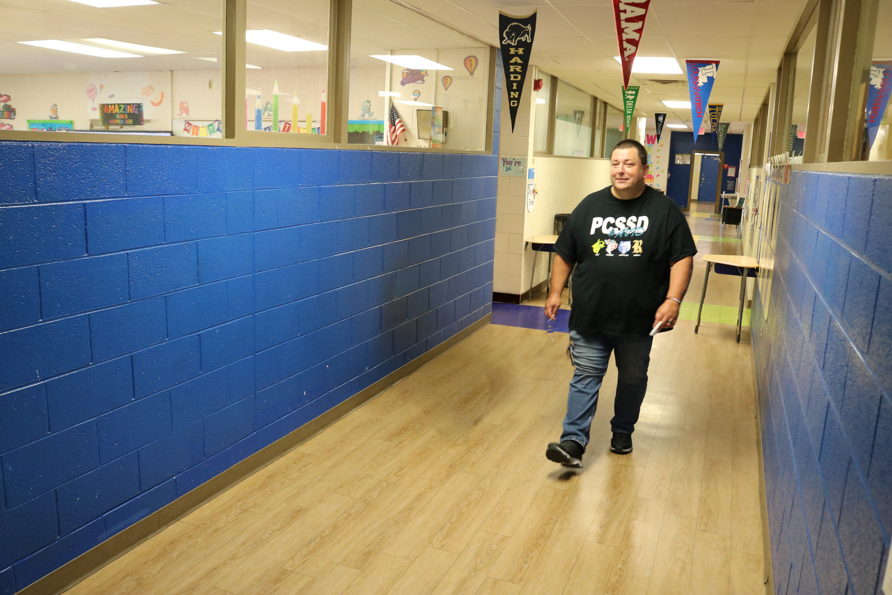 Dr. Matt Mellor walking down a hallway