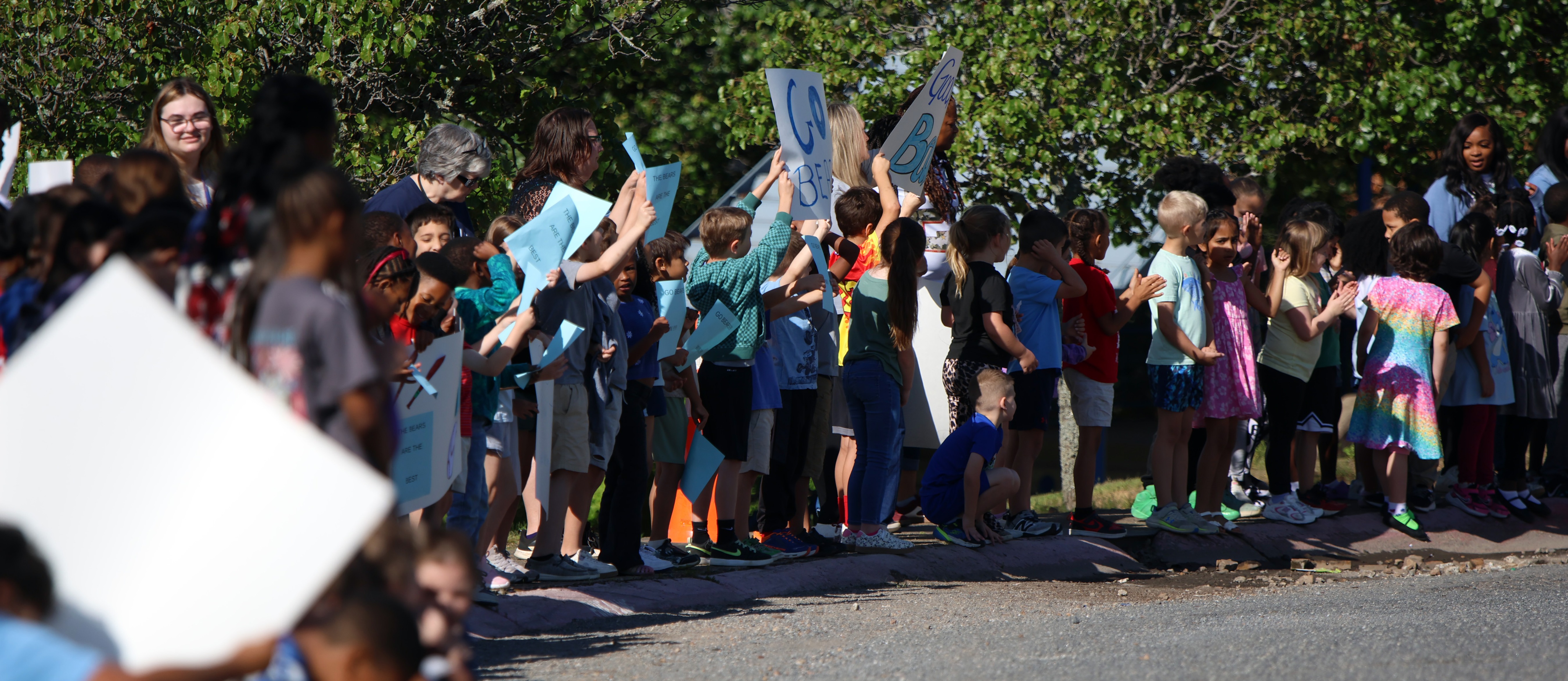 Sylvan Hills Elementary lined up with signs.