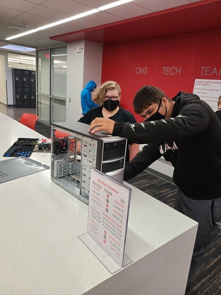 Computer maintenance class are diving in and learning how to repair computers