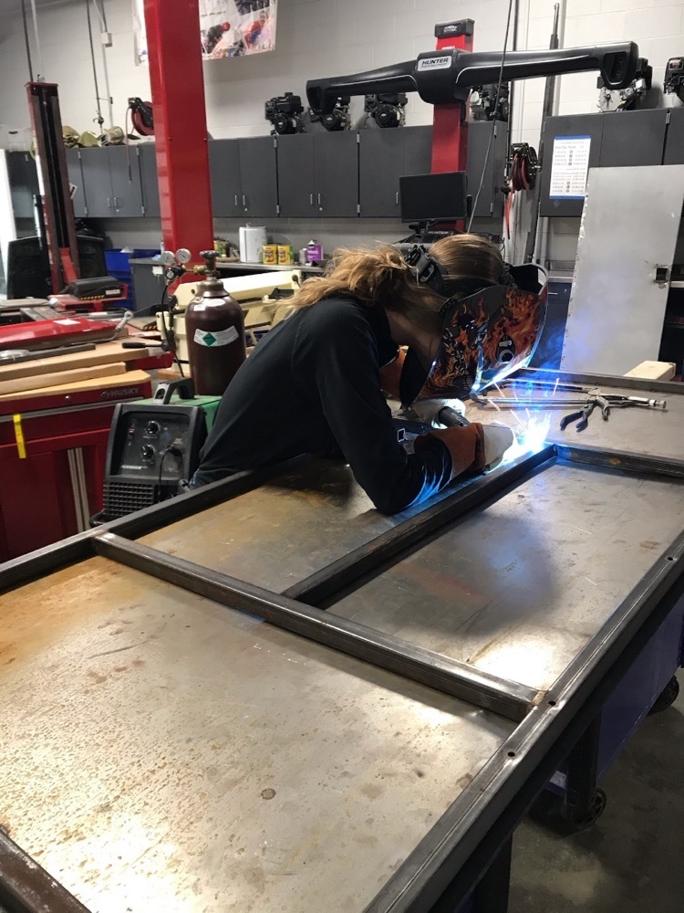 welding the back door of the STEAM bus