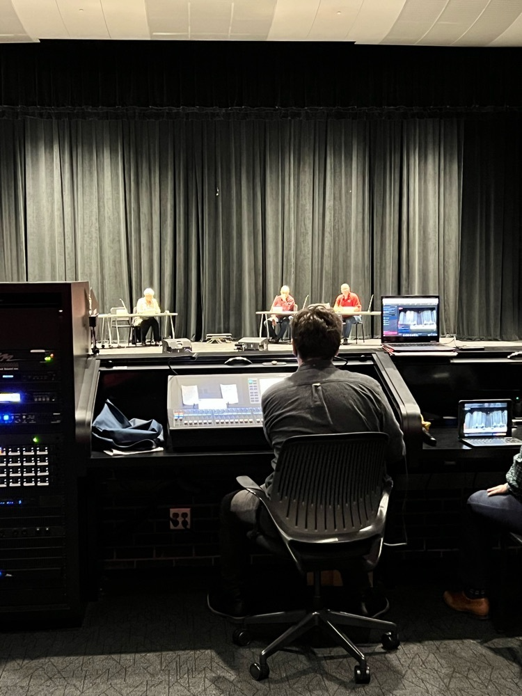 Alex Chidster running the sound board in the PAC