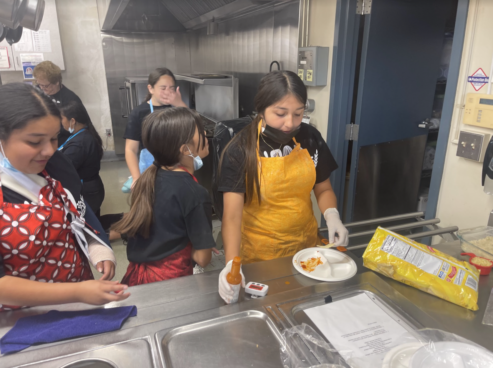 Students cooking in the kitchen