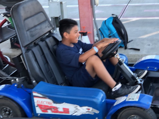student in go cart 