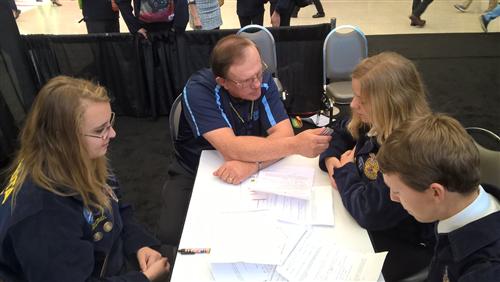 Grace taking part in the radio interview as Austin and Katie prep for their turn with the microphone. The radio interview is a great chance to discuss the FFA college and career show as well as the general FFA sessions.