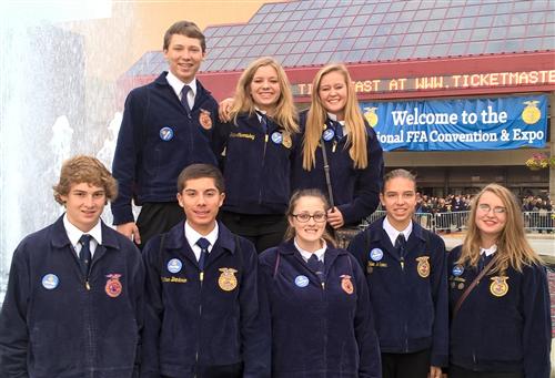 Looking the part in Official FFA Dress outside Freedom Hall in Louisville at the National FFA Convention. Representing NYA FFA in 2015 was Austin Pysick, Grace Cummiskey, Rachel Slathar (back row), Andrew Heuer, Matthew Brinkman, Lizzie Perez, Abbie Weckman, and Katie Weckman (front row).