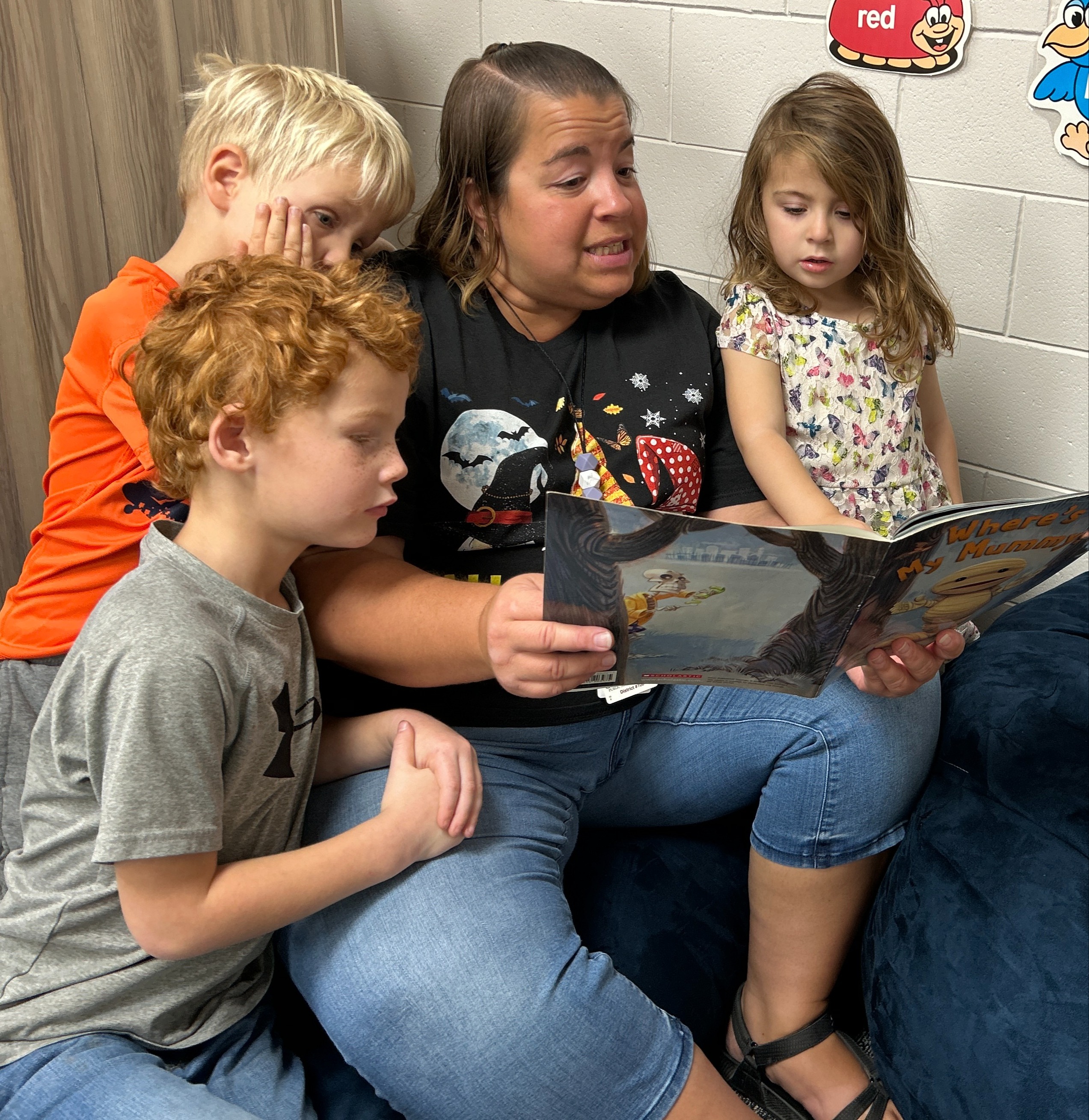 Teacher reading to kids