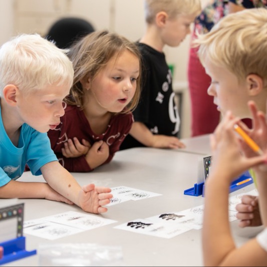 Students at a table working together