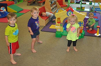 The students playing on their classroom