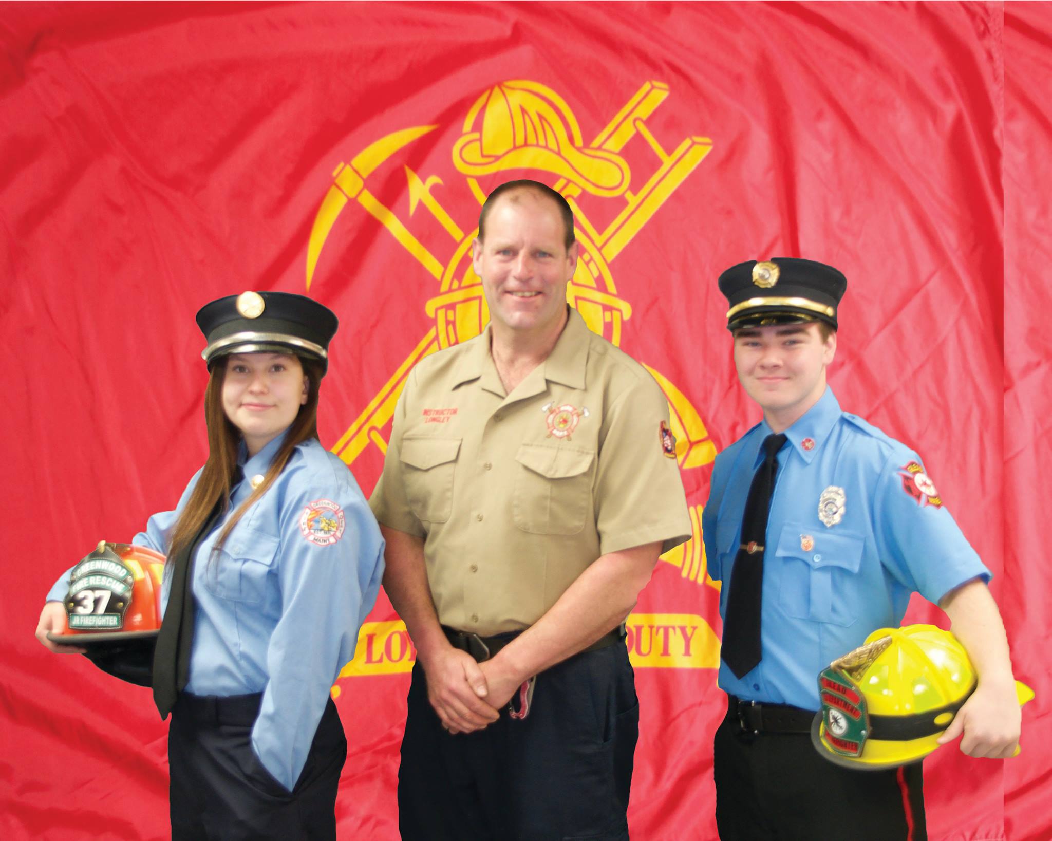 Mr. Longley with two Fire Science graduates in uniform