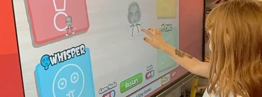 Student using interactive white board.