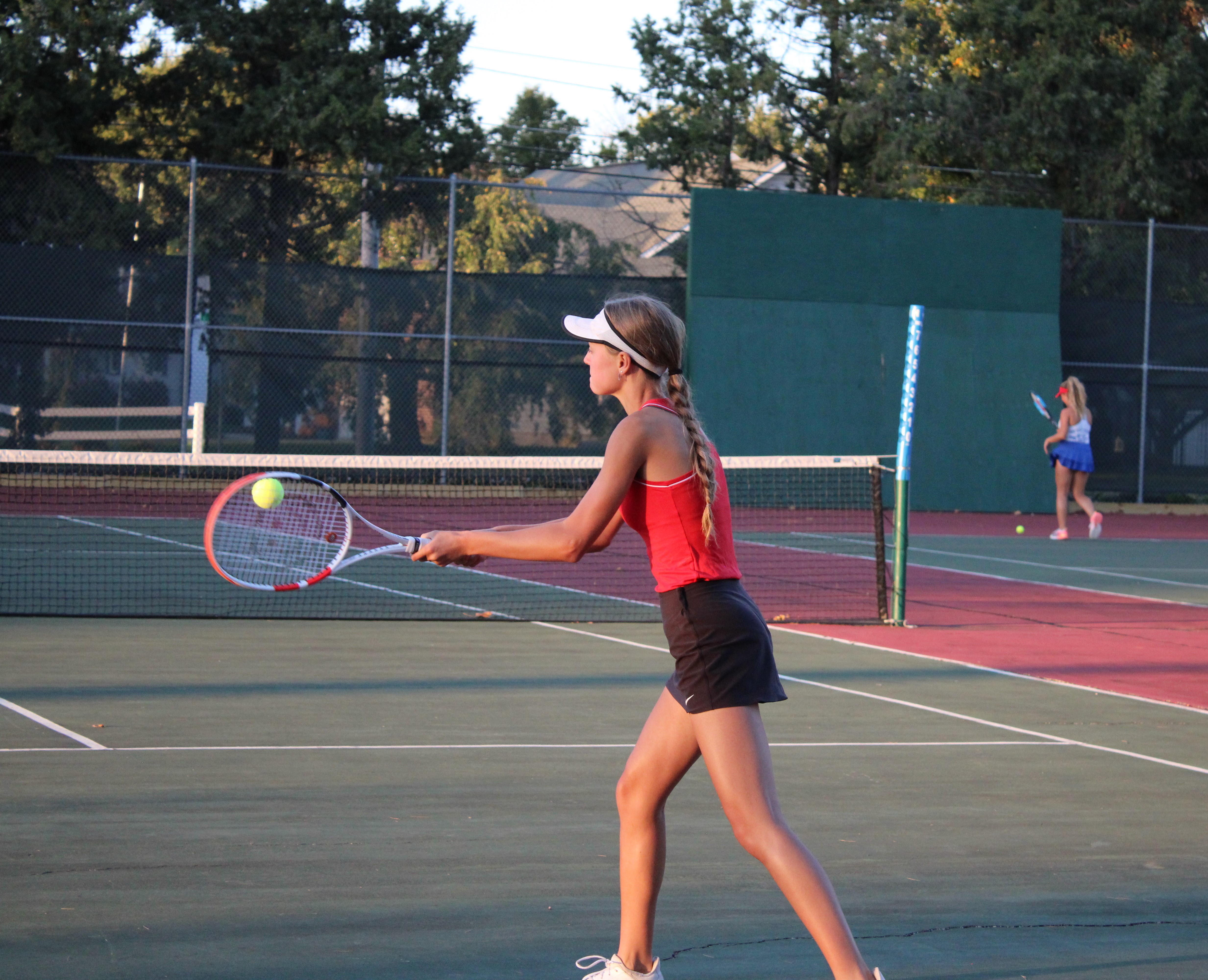 CHS tennis player in match