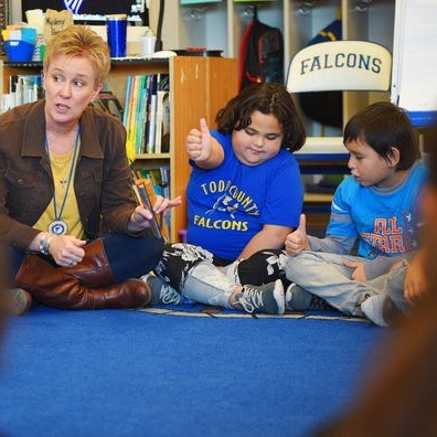 Teacher doing activities with our students.