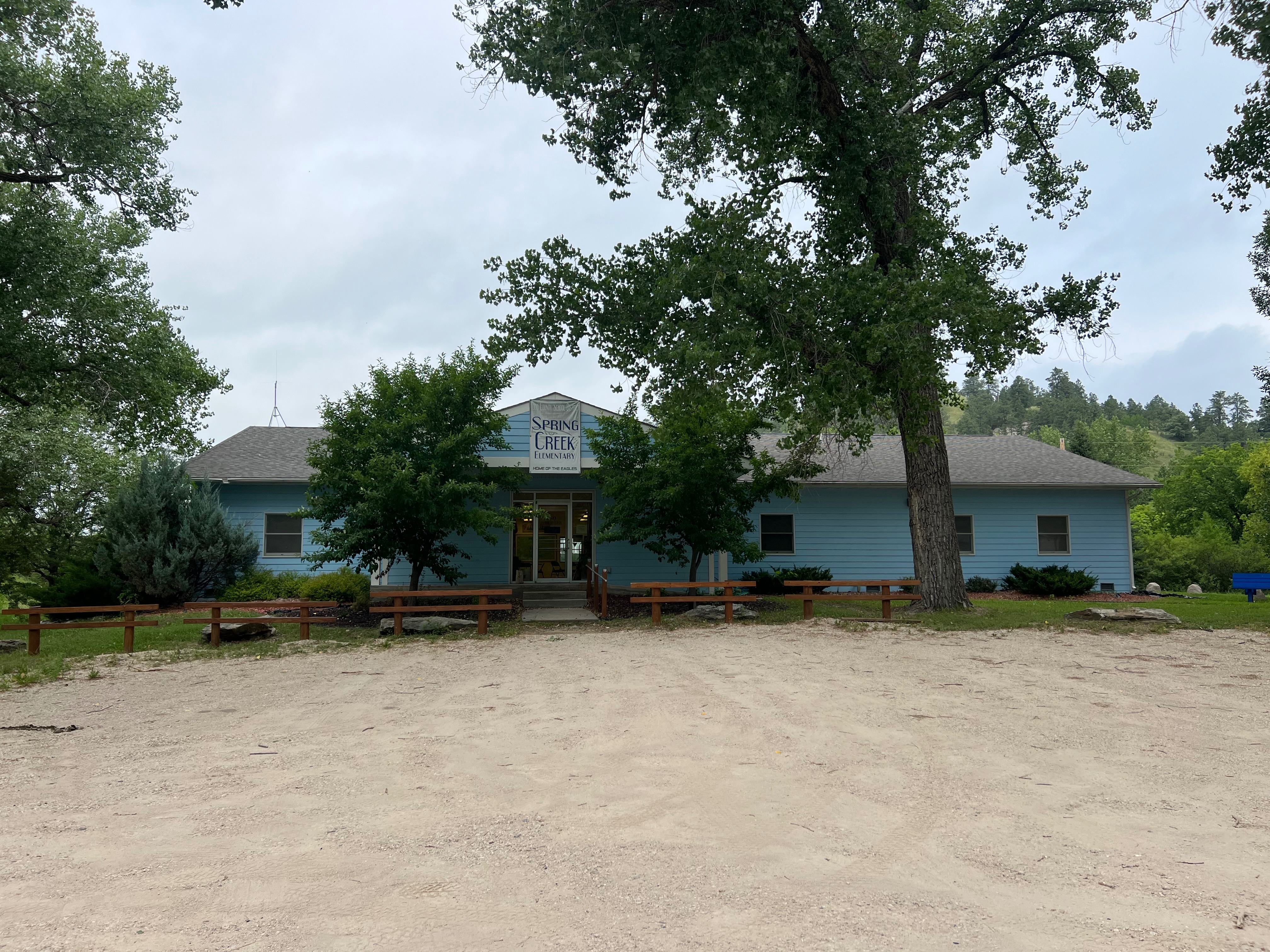 A photo of the SPRING CREEK SCHOOL.