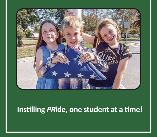 "Instilling Pride One Student as a Time" wording. With a picture of three kids smiling at the camera and one holding a folded american flag. 